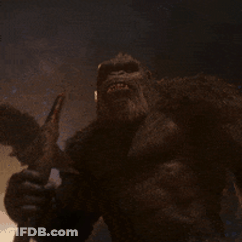 King Kong Displaying His Catch Roaring Forcefully GIF