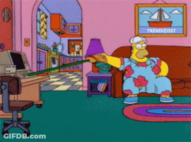 King-Size Homer Working And Watching GIF