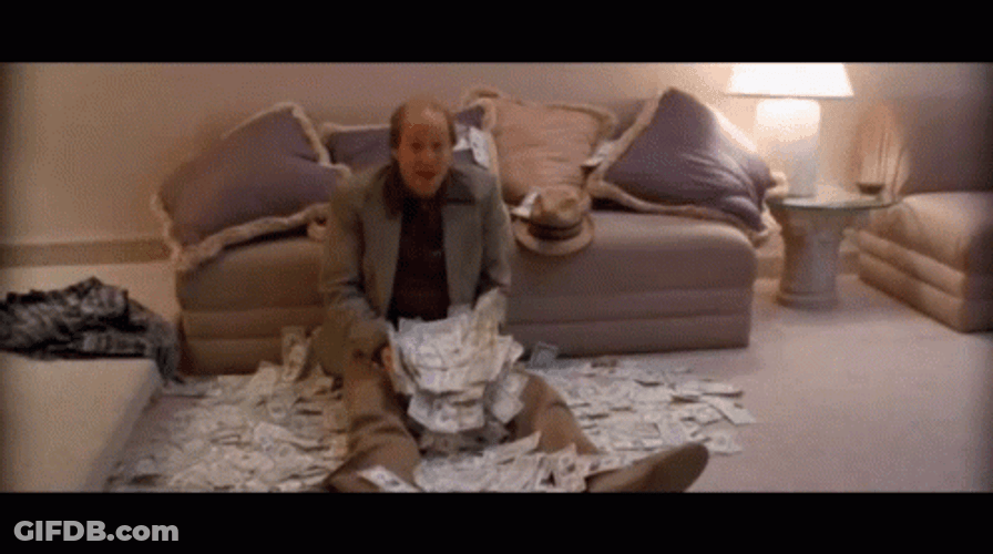 Kingpin Woody Harrelson Tossing Money GIF