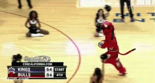 Kings And Bulls Playing Basketball With Cheerleaders GIF