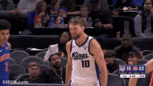 Kings Basketball Player Standing In Front Of Crowd GIF