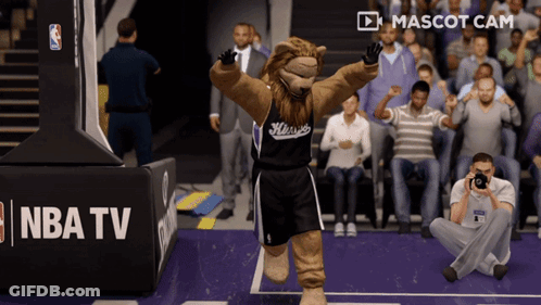 Kings Mascot Waving In Front Of NBA TV Sign GIF