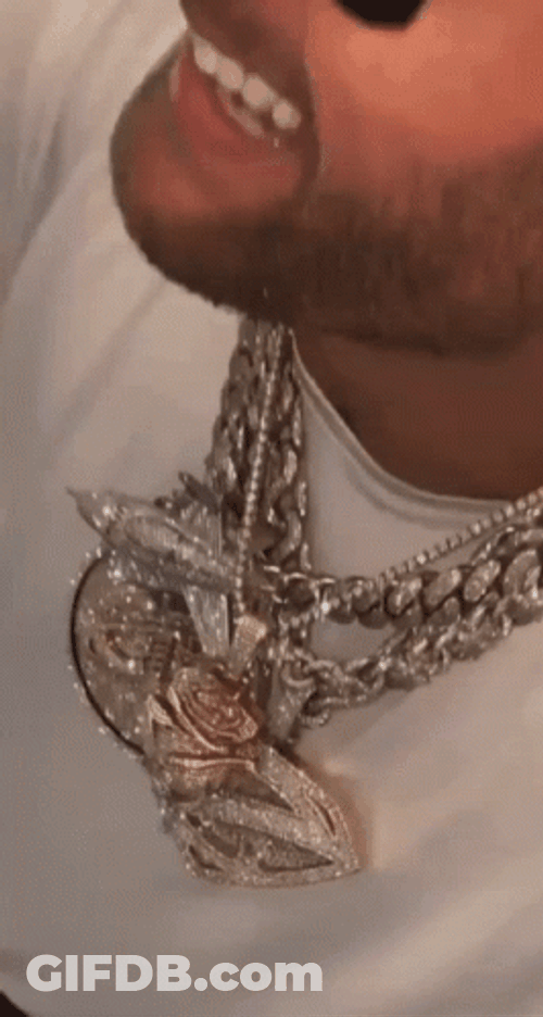 Kirk Cousins Wearing Silver Necklace GIF