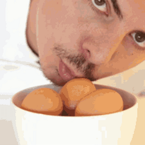 Kissing An Egg On A Bowl GIF