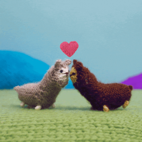 Kissing Crocheted Alpacas GIF