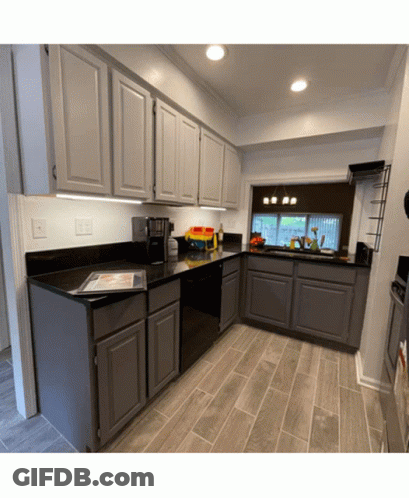 Kitchen Gray Cabinets Black Counters GIF