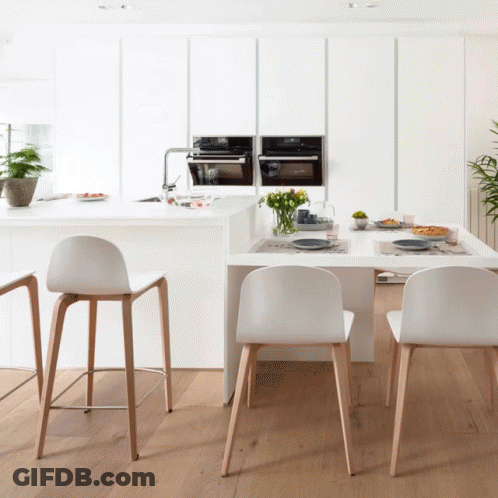 Kitchen Table And Chairs With Plates And Utensils GIF