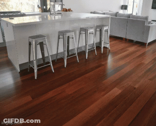 Kitchen With Stools And Fruit Bowl GIF