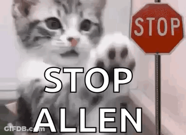 Kitten Waving Next To Stop Sign GIF
