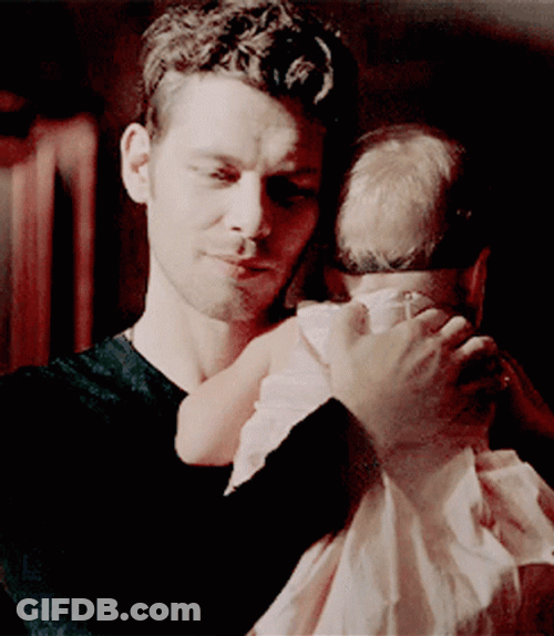 Klaus Mikaelson Holding A Baby GIF