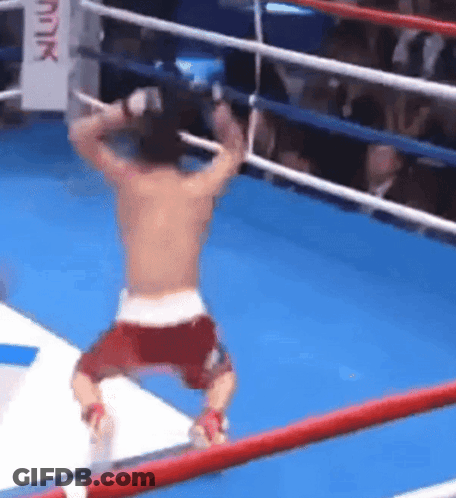 Kneeling Man In Boxing Ring GIF