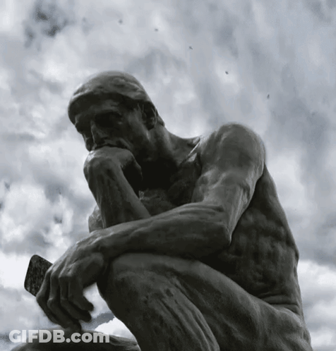 Kneeling Man Statue Hands On Chin GIF