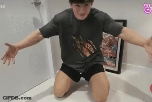Kneeling Man With Outstretched Arms GIF