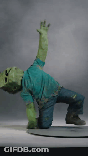 Kneeling Zombie Statue With Outstretched Arm GIF