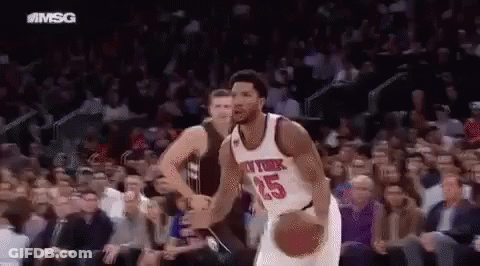 Knicks Player Dribbling Basketball In Front Of Crowd GIF