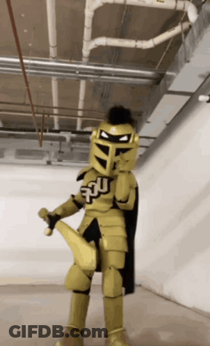 Knight Costume With Letter U GIF