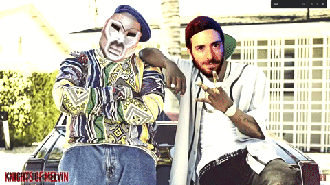 Knights Of Melvin Poster With Two Men Posing GIF