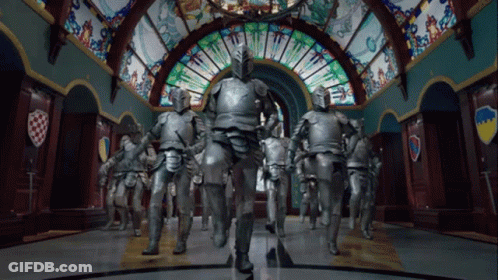 Knights Walking In Hallway With Stained Glass Window GIF