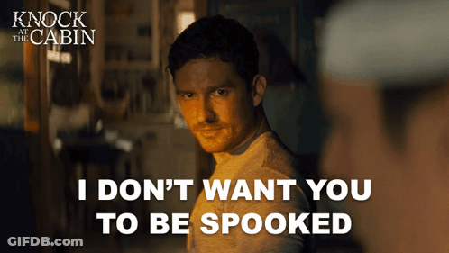 Knock At The Cabin Movie Poster Man Talking To Another Man GIF