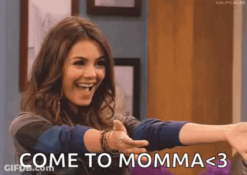 Knox Holding Football With Arms Outstretched GIF