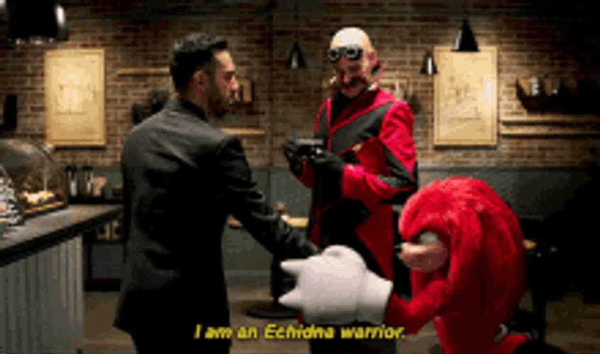 Knuckles Twisting Enemy's Arm Showing Power GIF