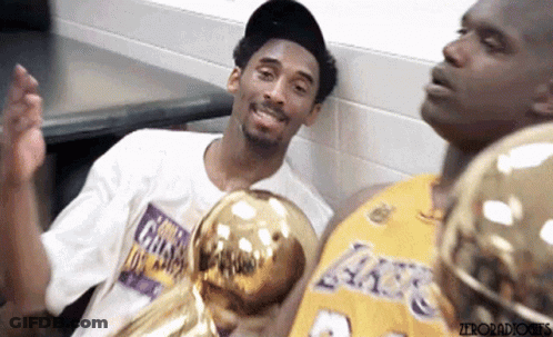 Kobe Bryant And Shaquille O'Neal Holding Lakers Trophies GIF