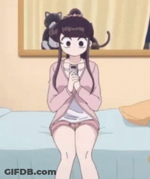 Komi Playing With Phone GIF