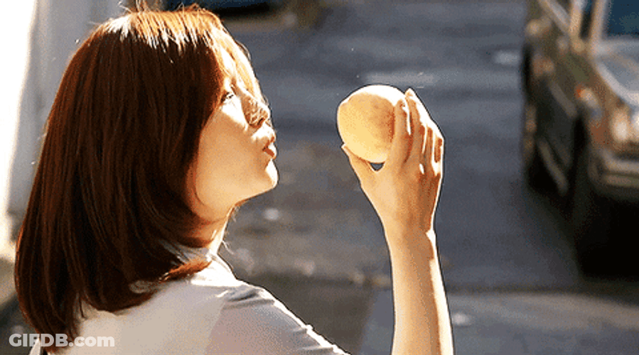 Korean Park So-Dam Adoring Her Peach GIF