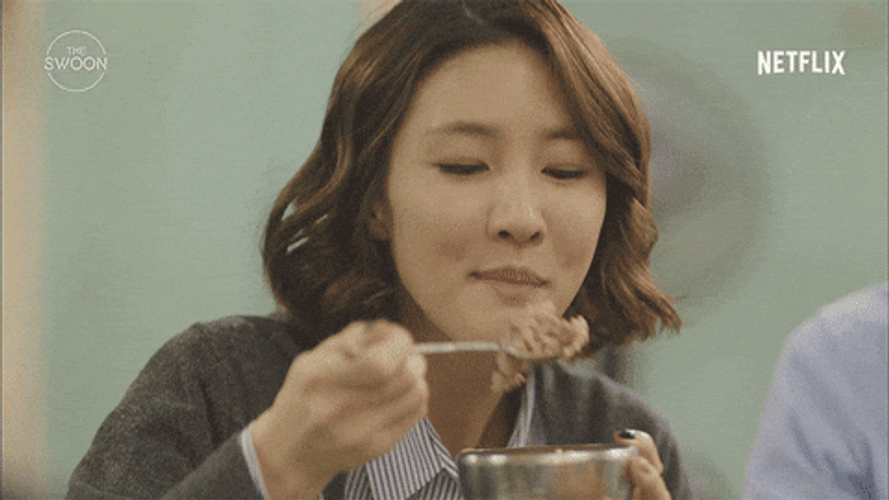 Korean Woman With Short Hair Eating Rice GIF