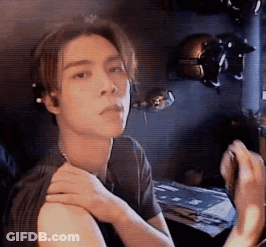 Kpop Boy Band Nct 127 Johnny Flexing Bicep GIF