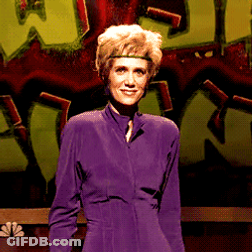 Kristen Wiig Awkward Smile While Dancing GIF
