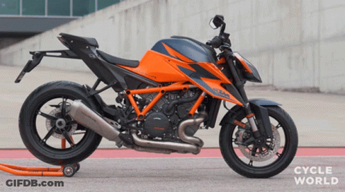 KTM Motorcycle Parked On Concrete GIF