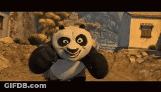 Kung Fu Panda Smiling In Front Of Building GIF