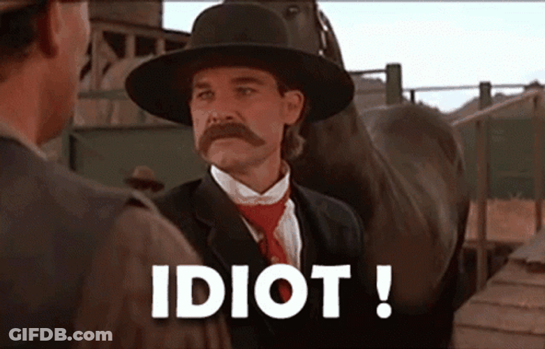 Kurt Russel Saying Idiot In Tombstone GIF