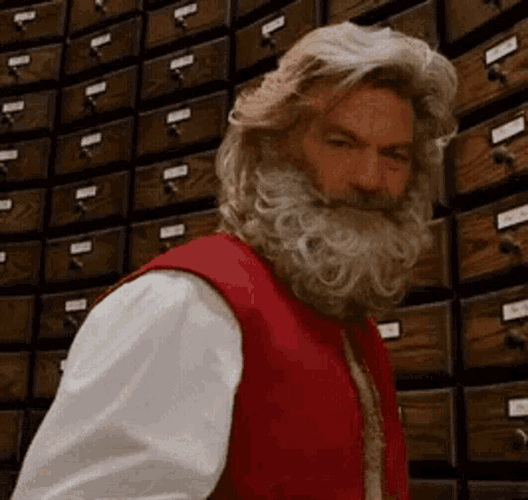 Kurt Russell As Santa Pointing GIF