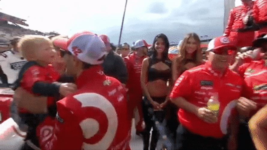 Kyle Larson Carrying His Son GIF