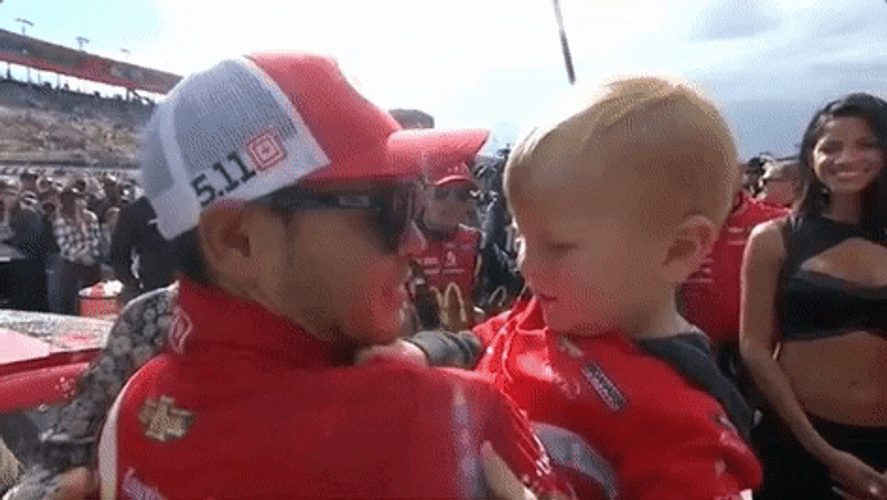 Kyle Larson Kissing His Son GIF
