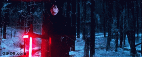 Kylo Ren Holding Red Lightsaber In Snowy Forest GIF