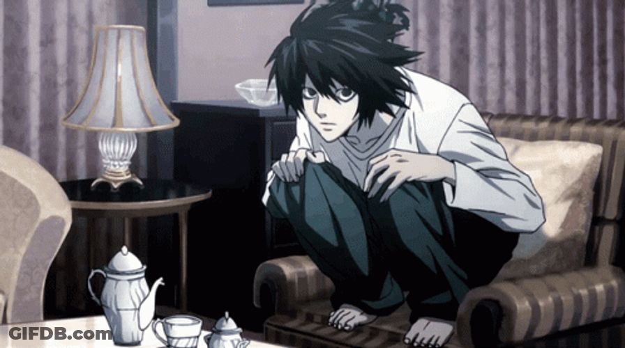 L Death Note Sitting On Couch GIF