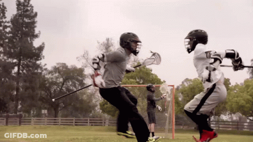 Lacrosse Player With Helmet And Gloves Number 7 GIF