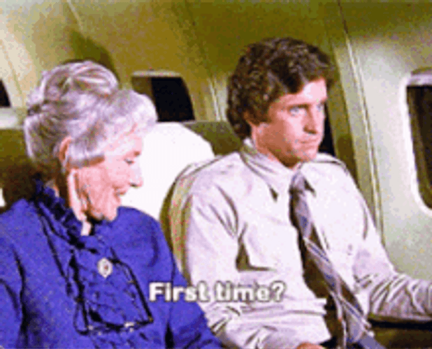 Lady Asking Man If First Time To Fly GIF