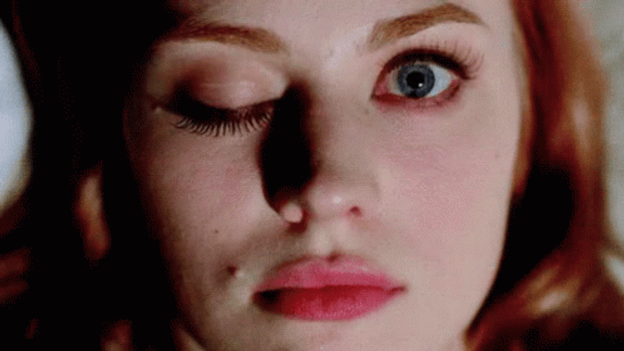 Lady Blinking Each Eye Alternately GIF