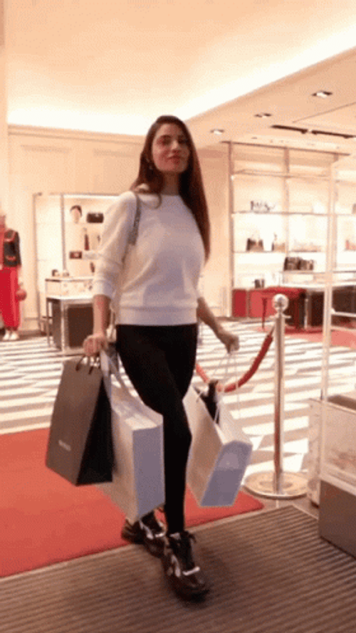 Lady Carrying Gucci Bags GIF