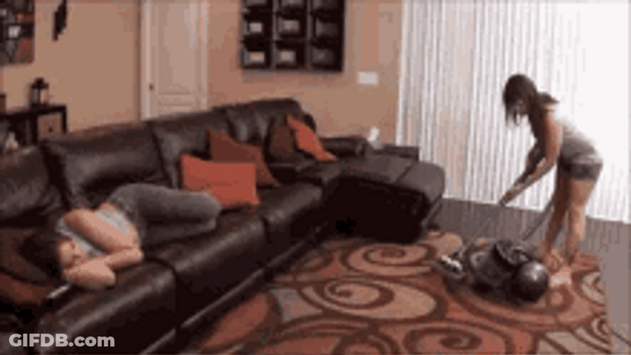 Lady Cleaning & Vacuuming The Carpet GIF