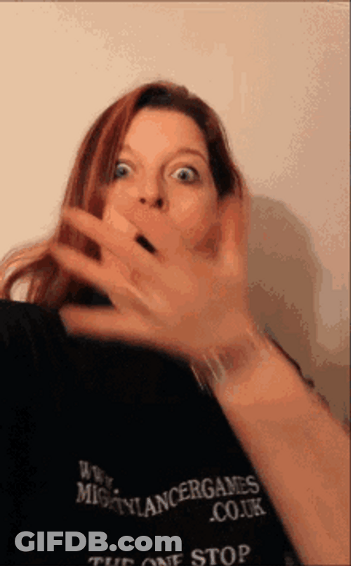 Lady Covers Mouth Surprised Face GIF