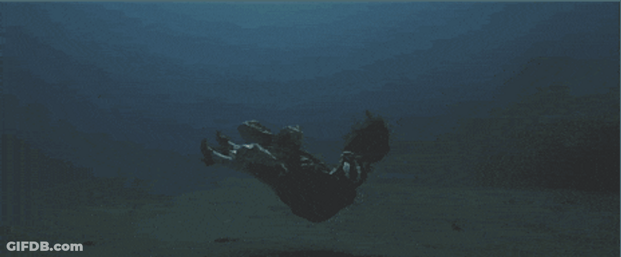 Lady Drowns In The Dark Underwater GIF