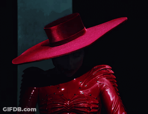 Lady Gaga In Red Dress And Large Hat GIF