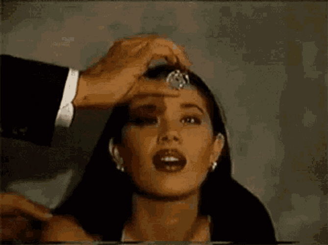 Lady Getting Sleepy As Hypnotized By Hypnotist GIF