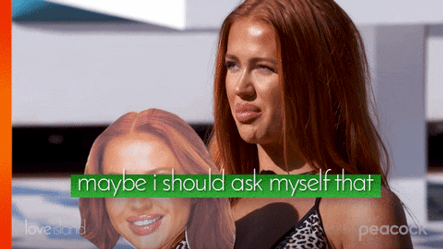 Lady Happily Holding Her Own Reflection GIF