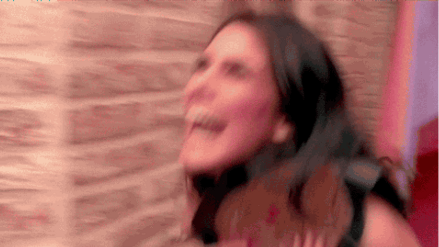 Lady Holding Wrestling Belt GIF
